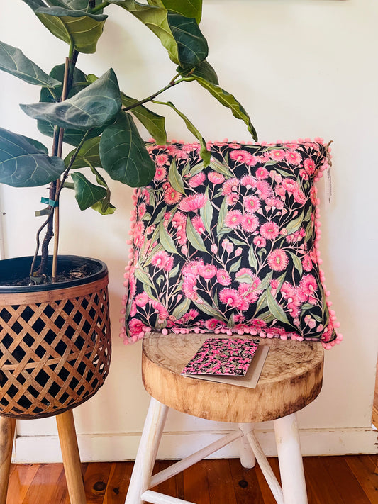Pink Flowering Gum Pom Pom Cushion on Black