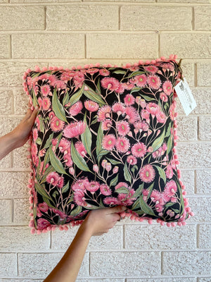 Pink Flowering Gum Pom Pom Cushion on Black