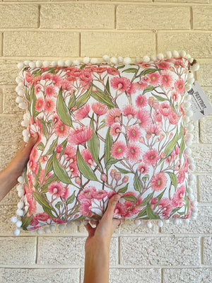 Pink Flowering Gum Pom Pom Cushion on white